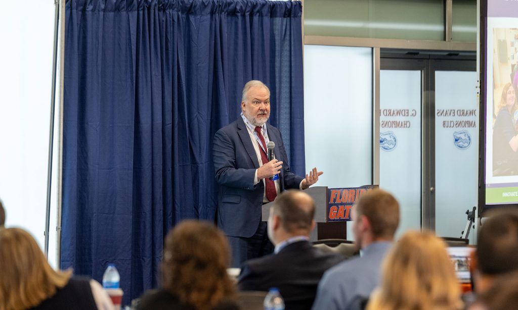 Craig Sloan, director of NNSA’s Office of Proliferation Detection, speaks during the 2025 National Nuclear Security Administration’s Office of Defense Nuclear Nonproliferation R&D University Program Review held at UF last week. Photo by SCAD Media